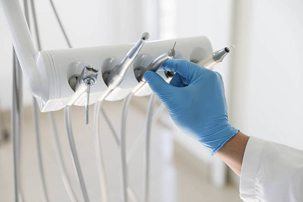 Professional Dental Crowns And Bridges technician working in Oyster Bay Cove, NY